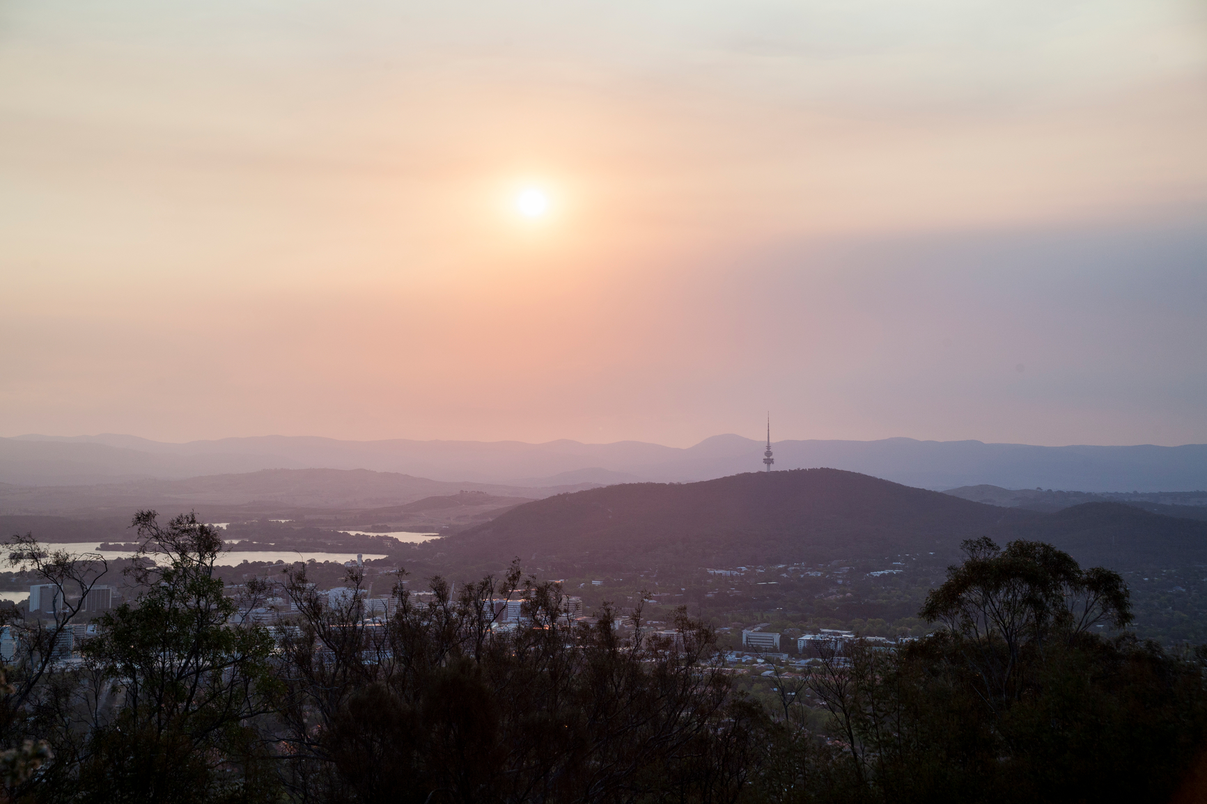 View of Canberra Australia during smoke haze affected sunset